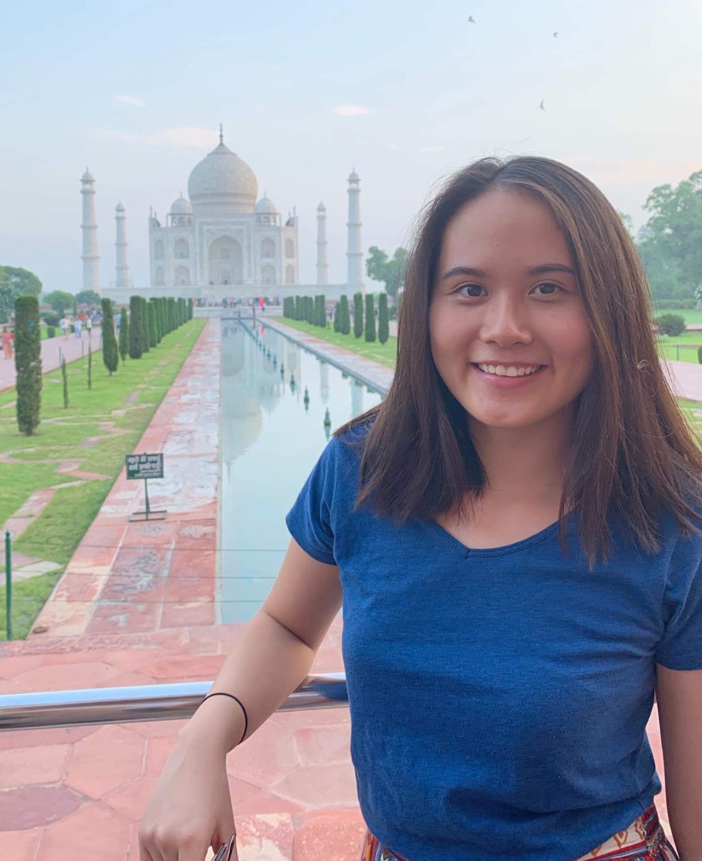 Mai posing in front of the Taj Majal